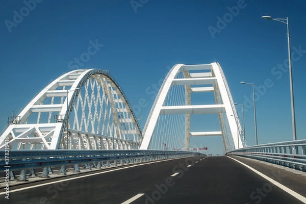 Obraz Arches of the Crimean bridge connecting the banks of the Kerch Strait: Taman and Kerch, Crimea. Russia