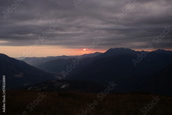 Fototapeta sunset in the mountains