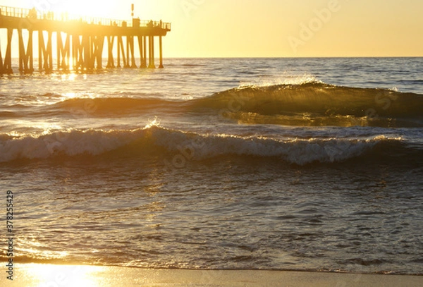 Obraz Waves crashing at sunset