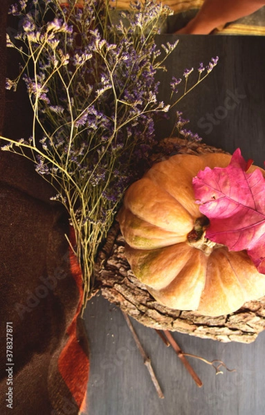 Obraz autumn leaves on old wooden table and pumpkin