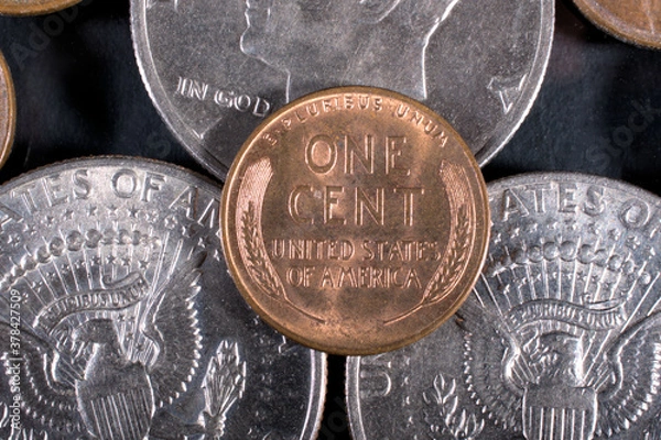 Fototapeta one dollar and one cent coins