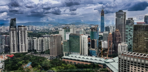 Obraz Kuala Lampur, Malaysia - November 2017. Photograph of the Kuala Lampur city from top of petronas twin tower showing modern highrise buildings.