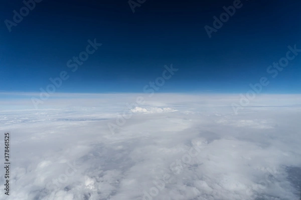 Obraz  Landscape over the clouds from airplane