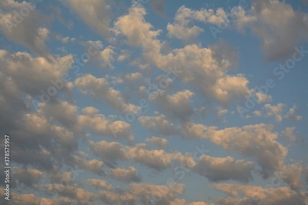 Obraz cumulus clouds on bright blue early Autumn sky