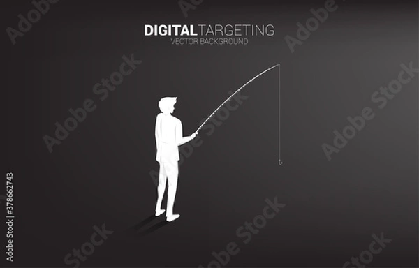 Fototapeta Silhouette of businessman standing with fishing hook. Concept of targeting and bait in business.