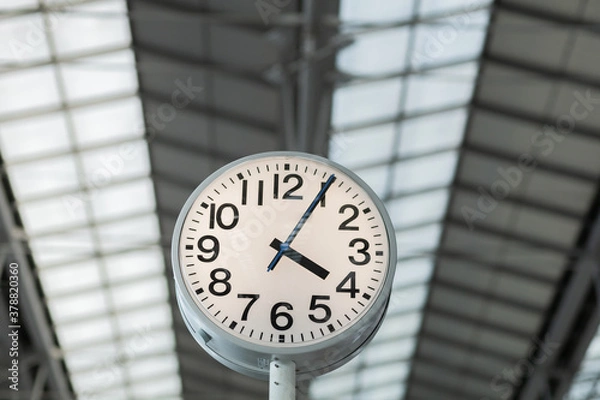 Obraz Analog indoor clock show time at 4.05 o' clock.