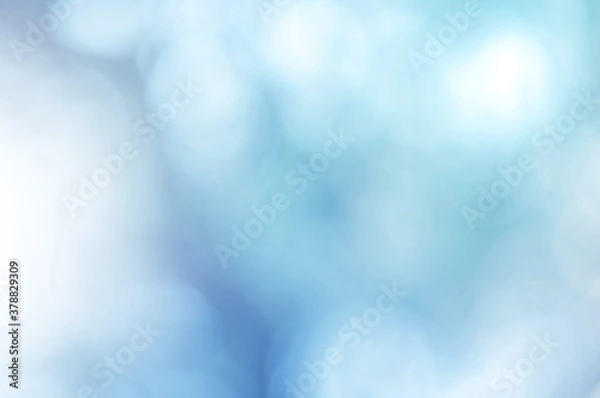 Fototapeta Light blue Leaf background. Blurred leaves and circular bokeh. Abstract for design and wallpaper.