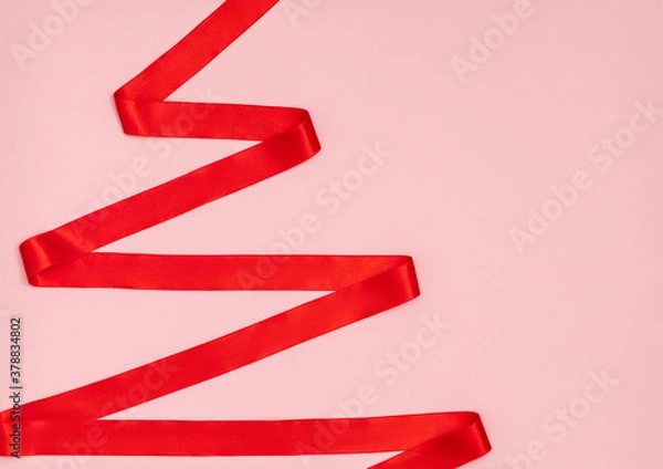 Fototapeta Red ribbon in the shape of a Christmas tree.