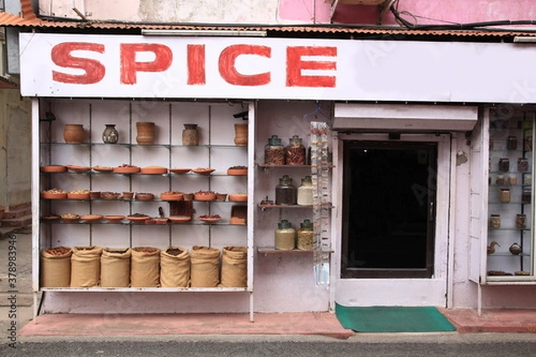 Obraz View of Indian spices and herbs in pottery displayed on the wall at Jew town, Kochi, Kerala, India