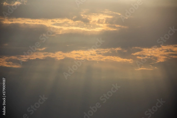 Fototapeta sun rays and clouds
