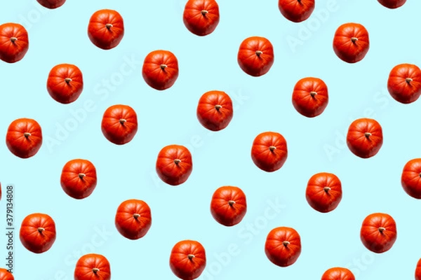 Fototapeta Pumpkin pattern on a blue background.