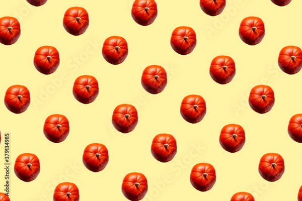 Fototapeta Pumpkin pattern on a yellow background.