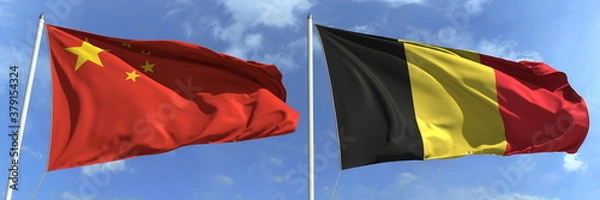 Fototapeta Waving flags of China and Belgium on flagpoles, 3d rendering