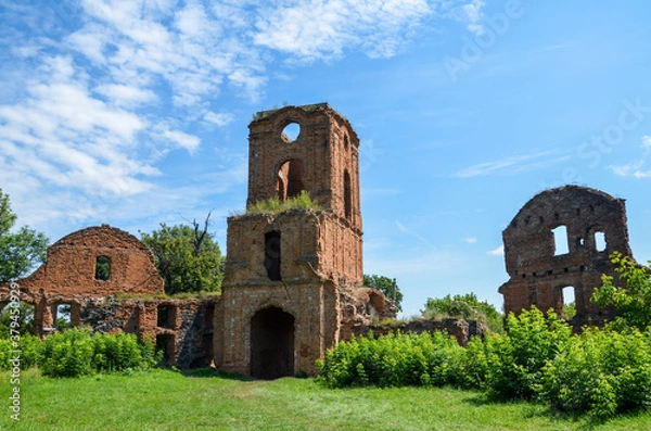 Fototapeta Three storey gate tower, adjoining the ruins of the outer walls of the palace buildings of Korets castle, Ukraine