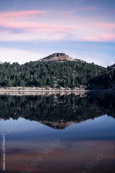 Fototapeta Reflections of mountains on a lake