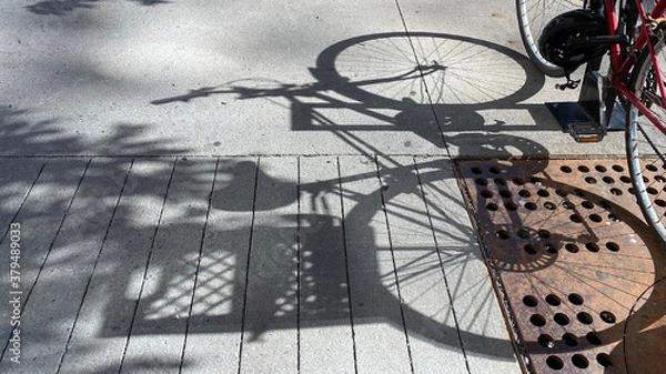 Obraz Bike shadow on sidewalk