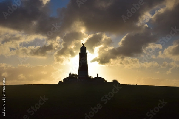 Fototapeta lighthouse at sunset