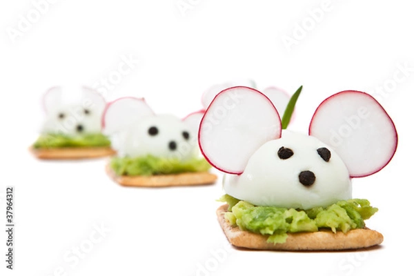 Fototapeta Mice made ​​with eggs, pepper, radish and avocado paste