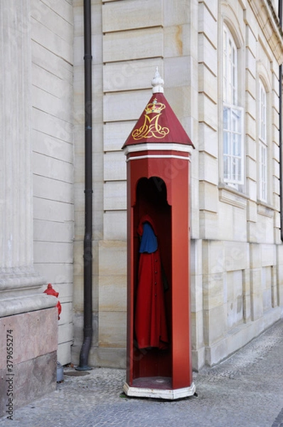 Fototapeta View of a special booth at the guard post near Amalienborg, where cloaks hang - a tribute to tradition, Copenhagen, Denmark.