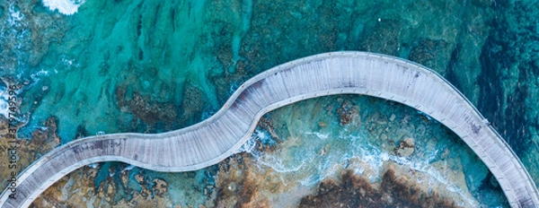 Obraz An aerial view of a walking path at Ayia Napa Cyprus during an amazing sunset
