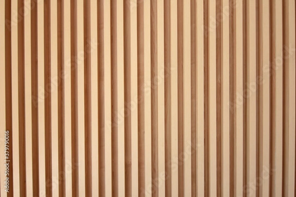 Fototapeta Light brown slats of wood. Lines of wooden slats form a striped texture pattern. Line shaped wood texture