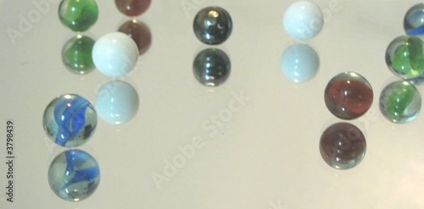 Obraz Marbles on a Mirror