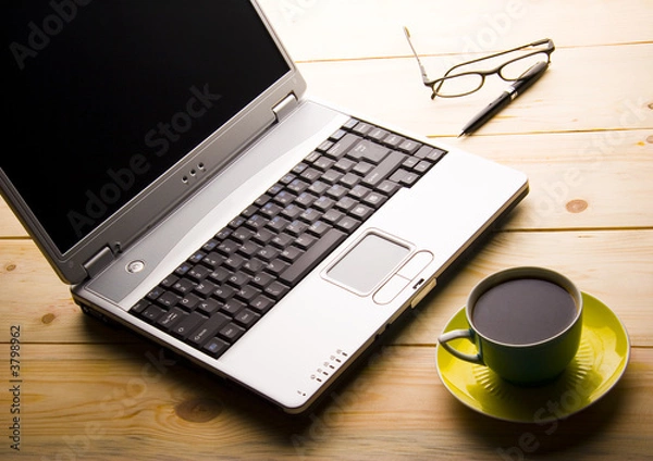 Fototapeta laptop and a cup of coffee