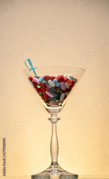 Obraz A collection of drugs in a cocktail glass concept