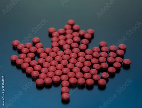 Obraz pills filling maple leaf as in Canadian flag
