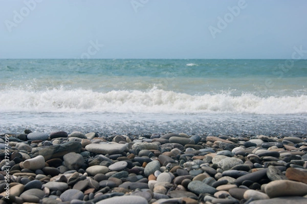Obraz A small storm three or four points at sea, the wave hits the shore with a large pebble. Black Sea, summer vacation vacation beach travel