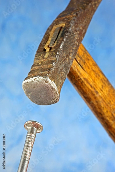 Obraz Den Nagel auf den Kopf treffen