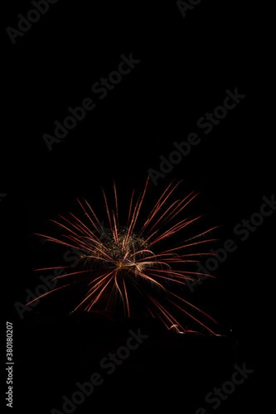 Fototapeta 4th of July and new year Fireworks in the night sky. Firework concept background.