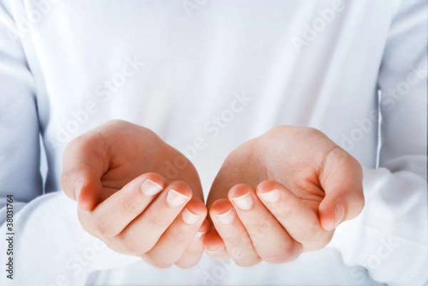 Obraz cupped empty hands in the act of presenting something