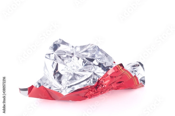 Fototapeta candy red wrapper empty and open isolated on white background with copy space for your text