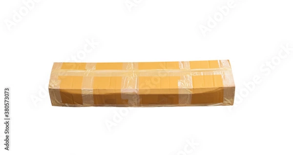 Fototapeta Long cardboard box closed  with tape , online purchase and delivery isolated on white background , clipping path