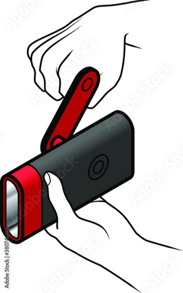 Fototapeta A crank operated manual charging handheld torch.