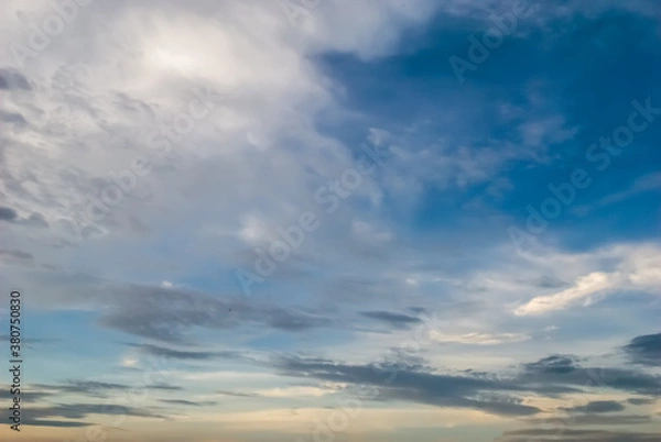 Fototapeta Beautiful evening sky and Clouds at sunset , dawn, the rays of the sun break through the clouds.