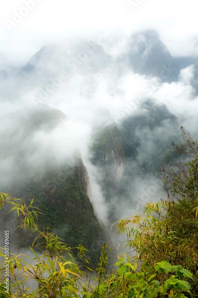 Fototapeta View of the Andes mountains and fog from the Inca trail near Macchu Picchu, Peru.