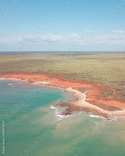 Fototapeta Drone shot of red sand coastline in Austrlia