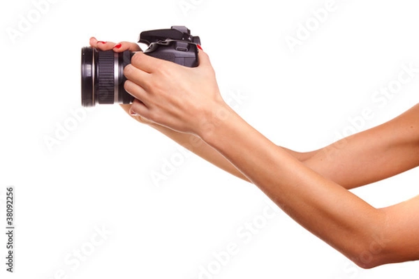 Obraz Women's hands holding the camera.