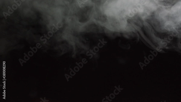 Fototapeta Realistic dry ice smoke clouds fog overlay perfect for compositing into your shots. Simply drop it in and change its blending mode to screen or add.