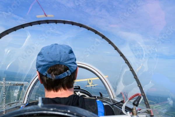 Obraz view in the cockpit behind the pilot during the flight