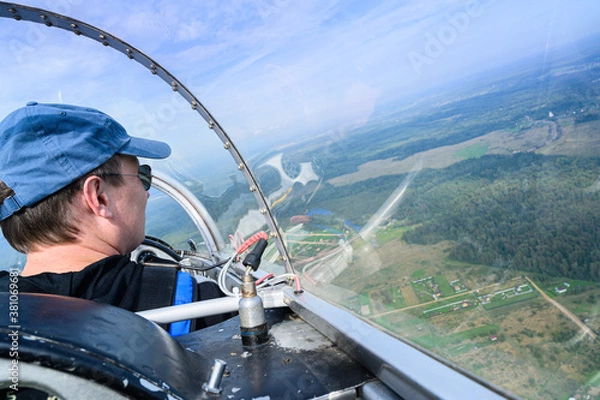 Obraz view in the cockpit behind the pilot during the flight