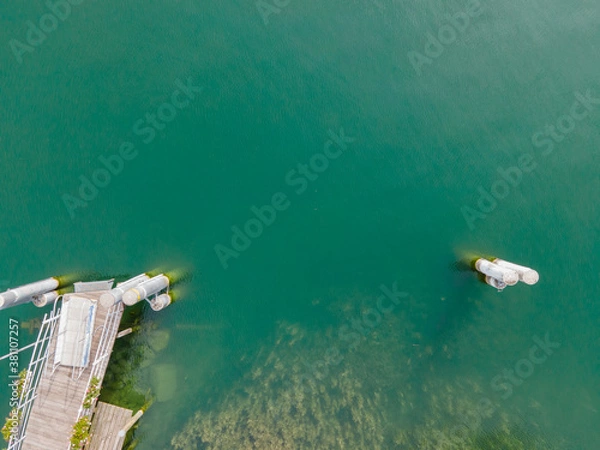 Fototapeta Drone shot over water. Background of lake. Birds view. Copy Space