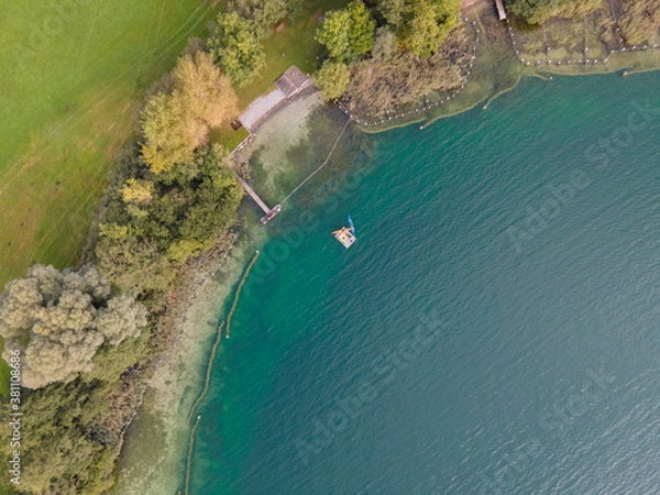 Fototapeta Drone shot over water. Background of lake. Birds view. Copy Space