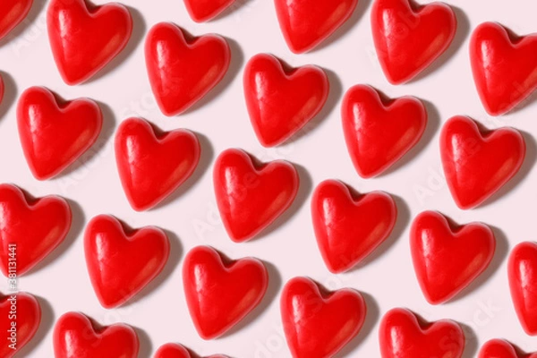Fototapeta Pattern. Many red hearts on a white background. Valentine's day concept.