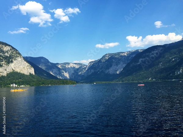 Obraz landscape of lake and mountains against blue sky at sunny day in Hallstatt Upper Austria