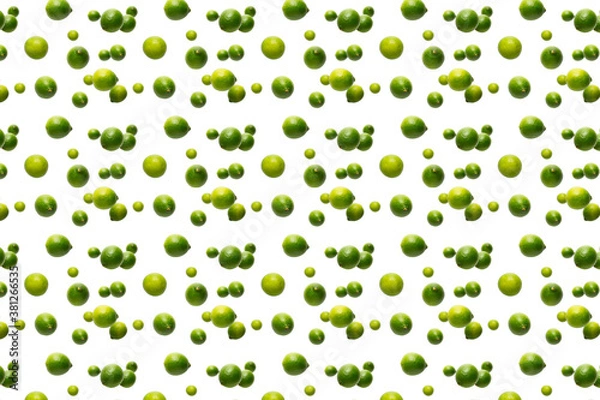 Fototapeta Falling lime isolated on white background. not pattern. Vitamin background made from falling limes.