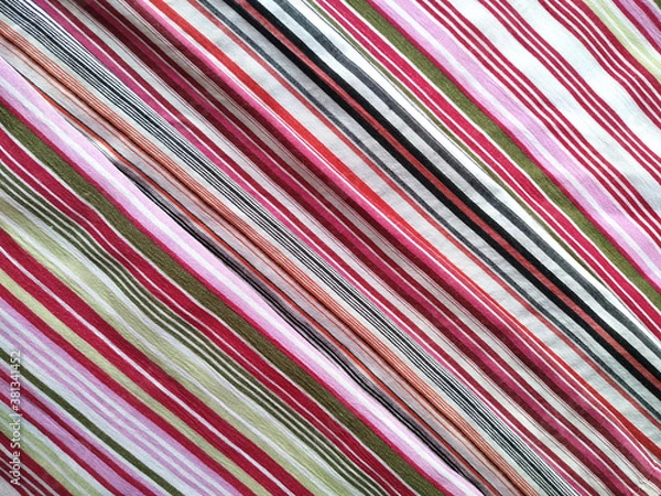 Obraz Striped diagonal fabric with geometric pattern. Abstract background.