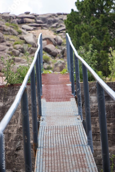 Obraz iron footbridge with handrail